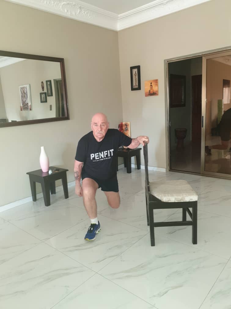 Leg lunge using a chair for support