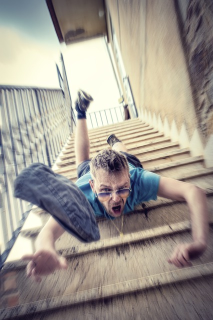 Image of a man falling on stairs to support the text