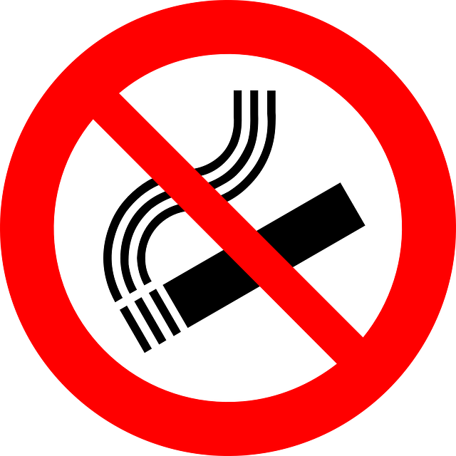 Image of a sign to ban smoking to support the text