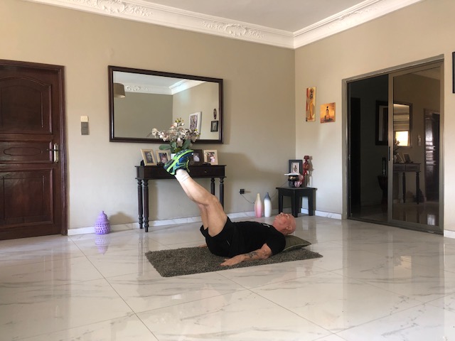 image of a straight leg raise as part of abdominal exercises