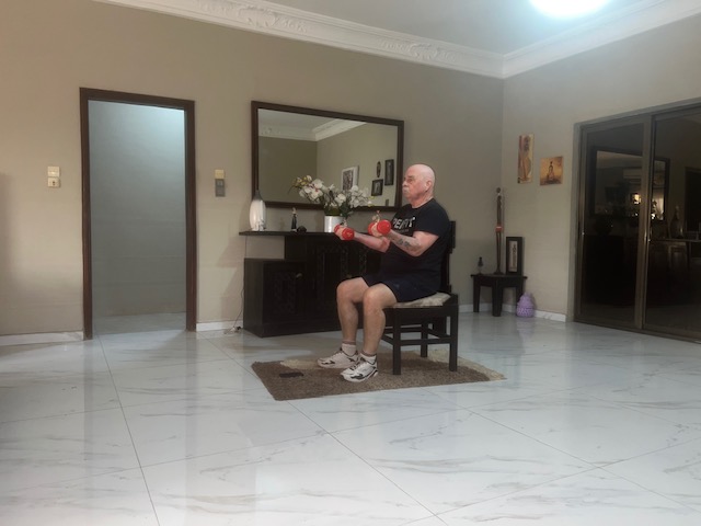 Isometric Seated Biceps Hold – Arms