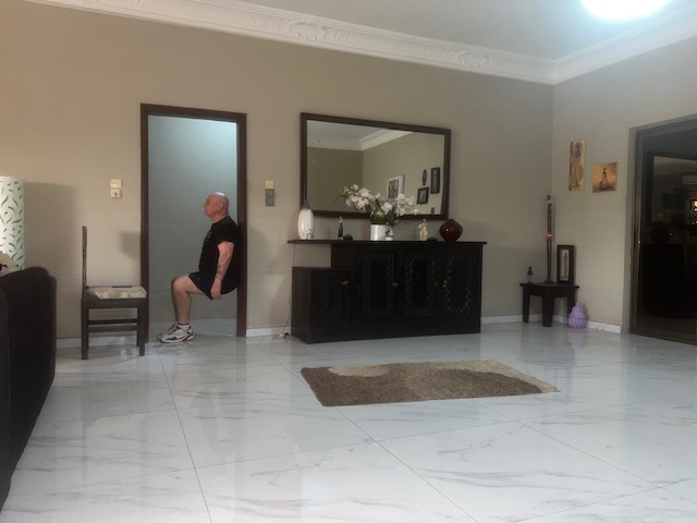 Isometric Wall Sit – Legs & Core